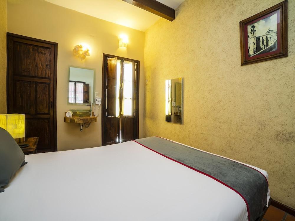 Collection O Al Otro Lado Del Rio, Puebla Otel Dış mekan fotoğraf A room at the hotel