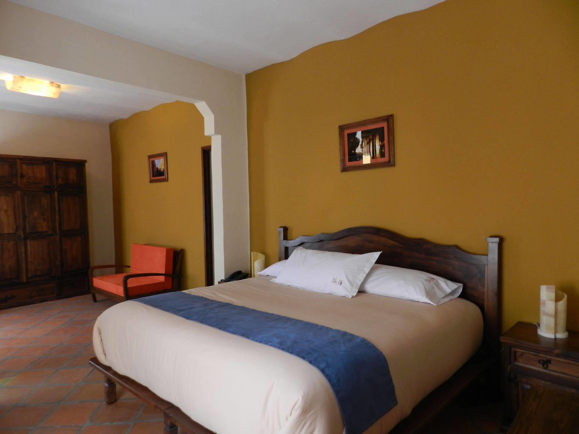 Collection O Al Otro Lado Del Rio, Puebla Otel Dış mekan fotoğraf A bedroom at the hotel
