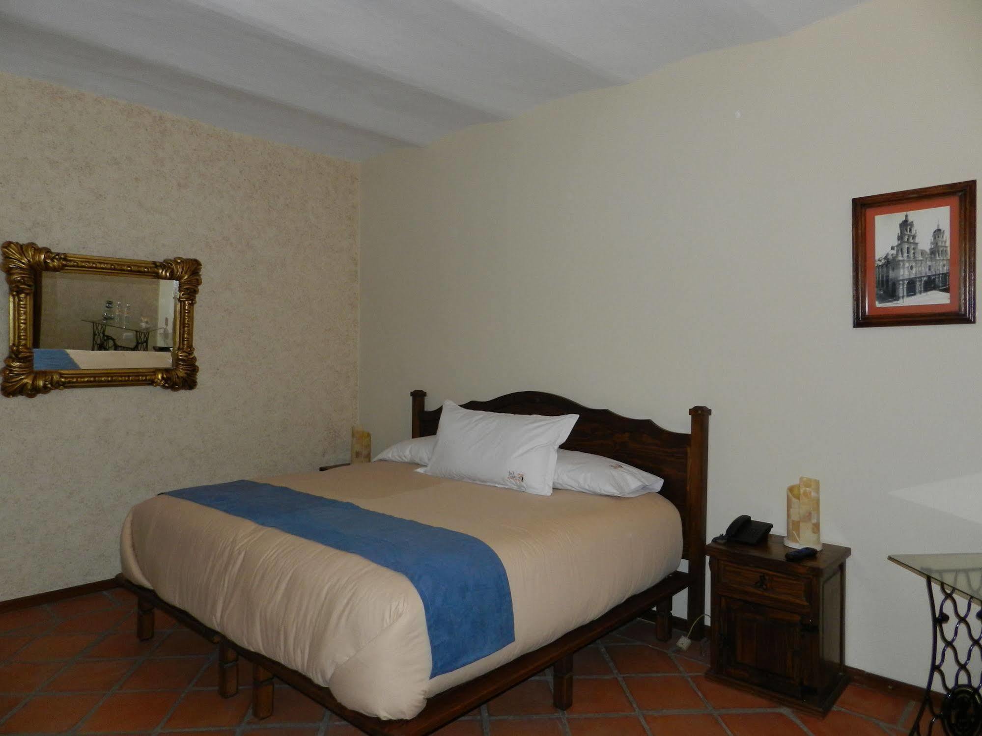 Collection O Al Otro Lado Del Rio, Puebla Otel Dış mekan fotoğraf A room at the hotel