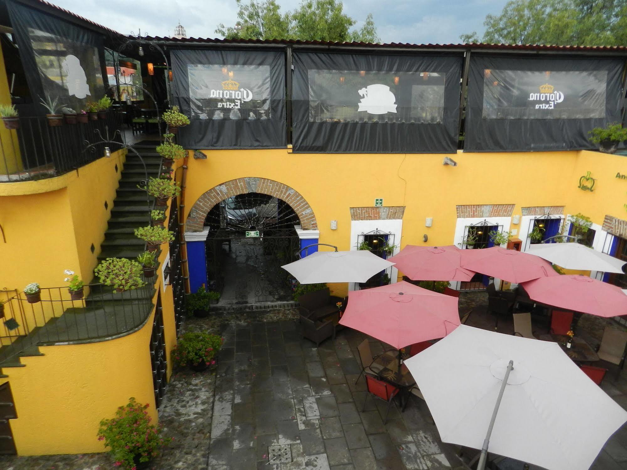 Collection O Al Otro Lado Del Rio, Puebla Otel Dış mekan fotoğraf The restaurant's patio